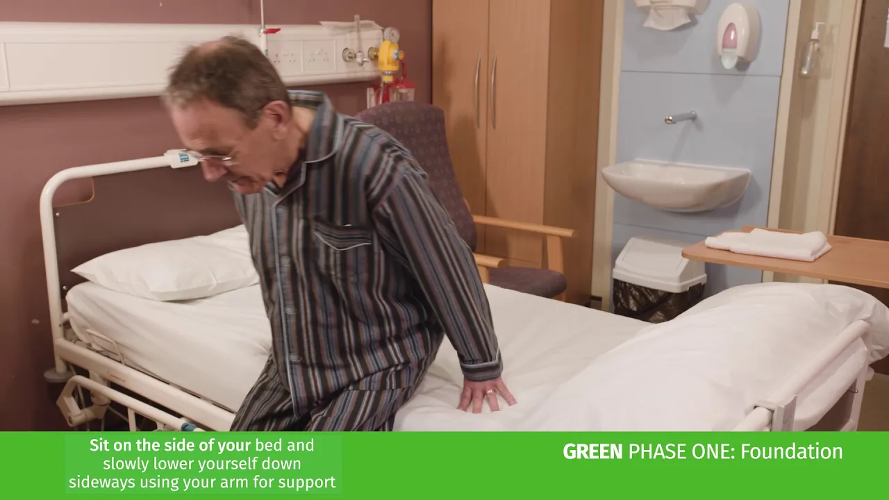 a man in a hospital bed