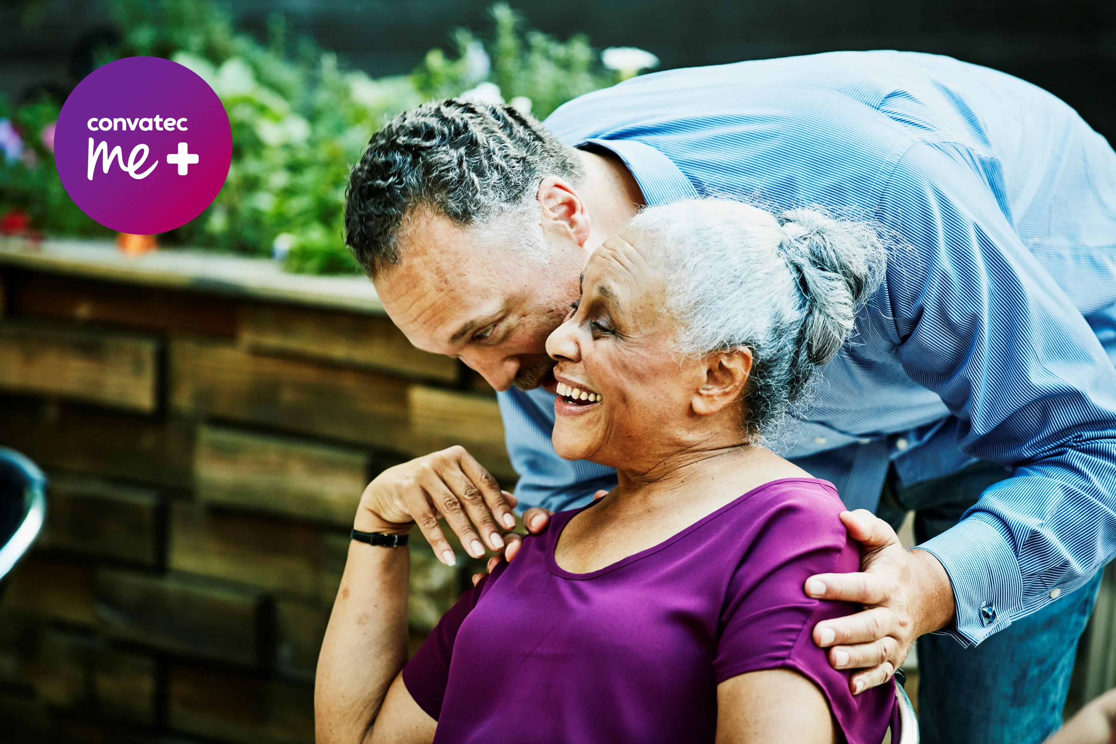 Nurse holding patient's hand