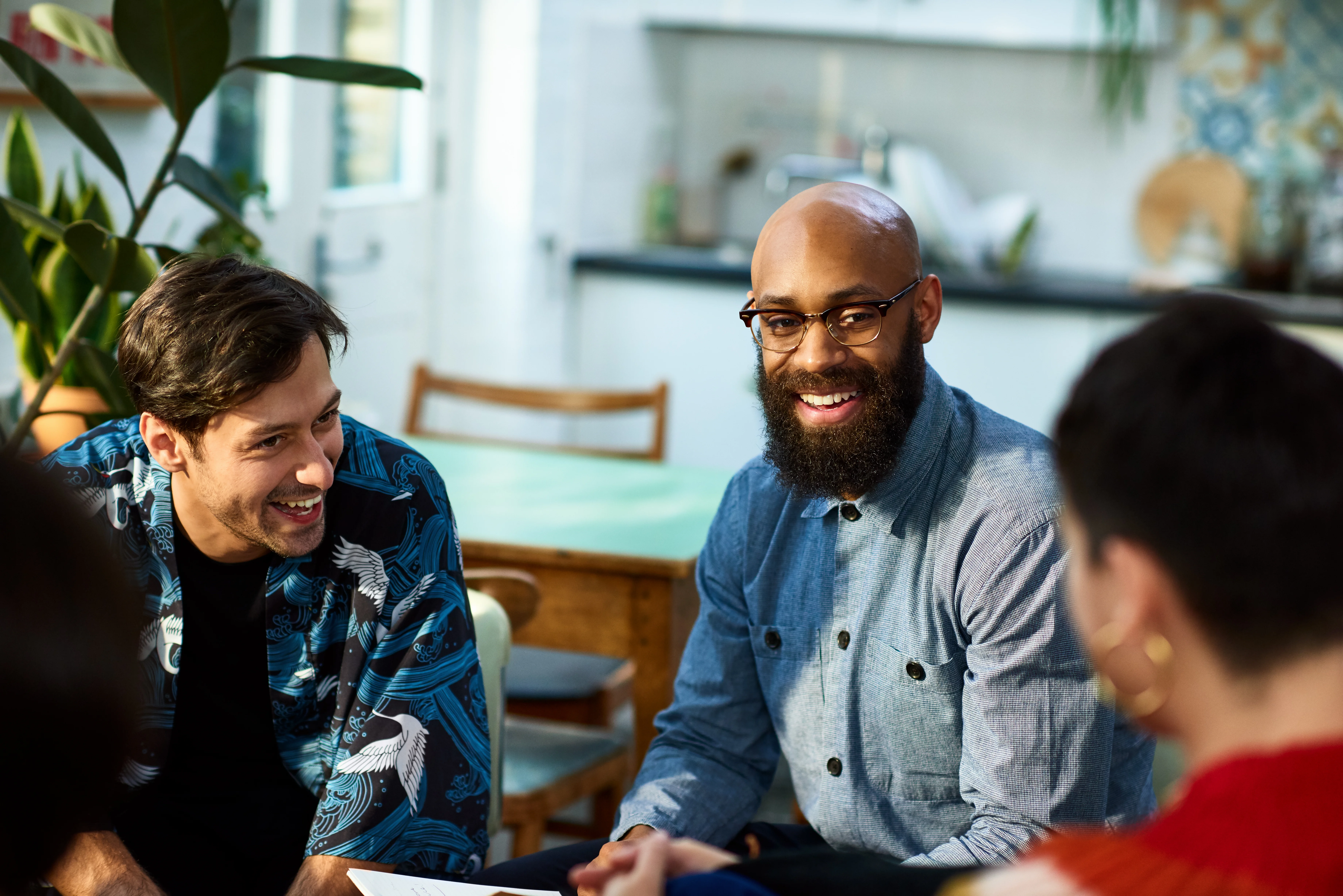 Image of a group of people laughing together
